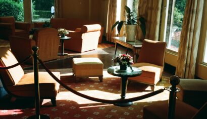 A living room filled with furniture and windows