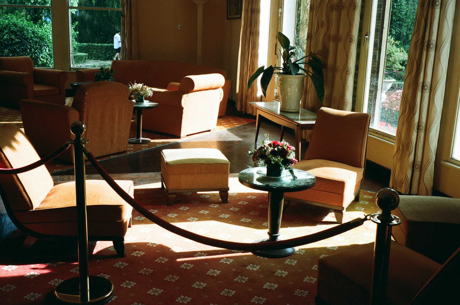A living room filled with furniture and windows
